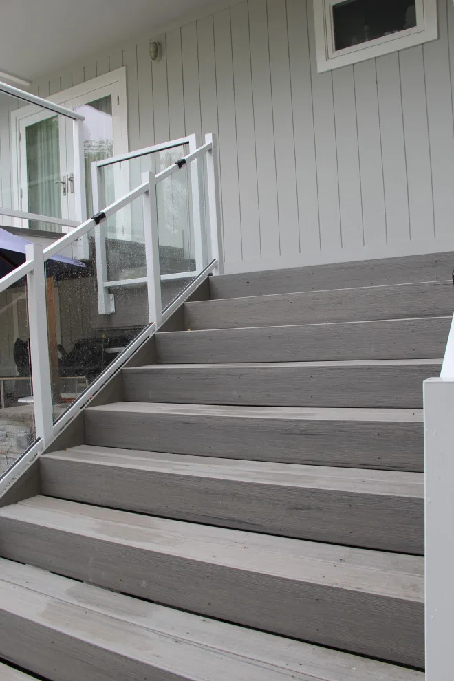 Contemporary Two-Tier Deck Featuring Custom Fireplace and Grill Area by Arroyo Grande Deck And Fence - Photo 7