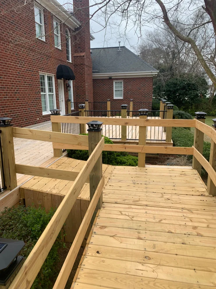 Expansive deck constructed atop an existing patio by Narron Woodworks - Photo 5