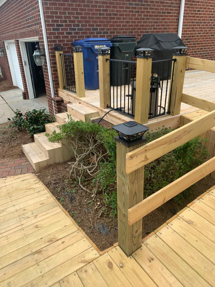 Expansive deck constructed atop an existing patio by Narron Woodworks - Photo 3
