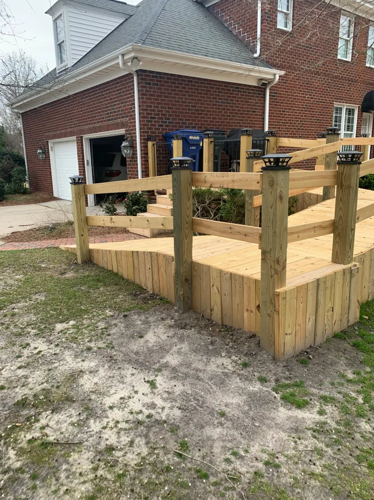 Expansive deck constructed atop an existing patio by Narron Woodworks - Photo 7