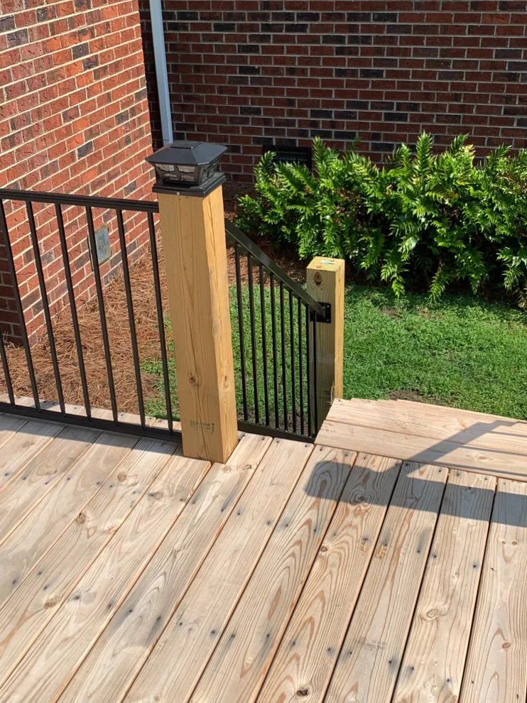 Expansive deck constructed atop an existing patio by Narron Woodworks - Photo 2