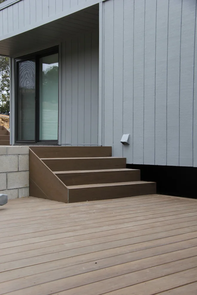 Dual-tier deck with a retaining wall by Arroyo Grande Deck And Fence - Photo 5