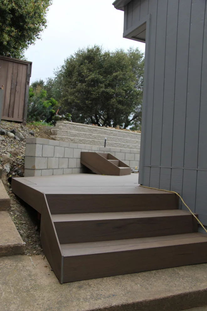 Dual-tier deck with a retaining wall by Arroyo Grande Deck And Fence - Photo 8