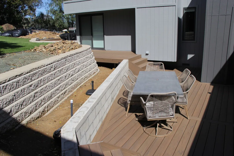 Dual-tier deck with a retaining wall by Arroyo Grande Deck And Fence - Photo 7