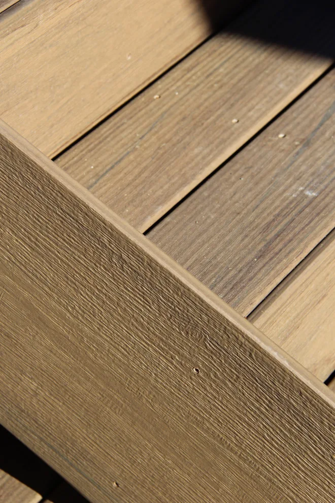 Dual-tier deck with a retaining wall by Arroyo Grande Deck And Fence - Photo 3