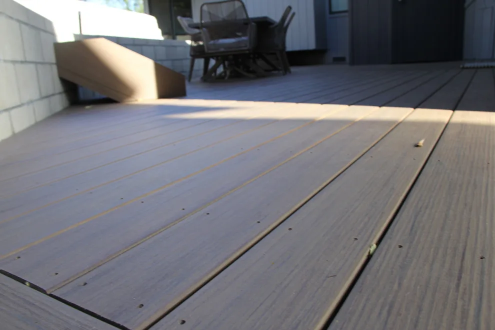 Dual-tier deck with a retaining wall by Arroyo Grande Deck And Fence - Photo 2