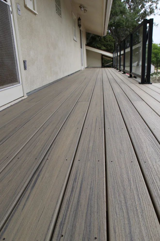 Effortless Composite Deck with Black-Framed Glass Railing by Arroyo Grande Deck And Fence - Photo 13