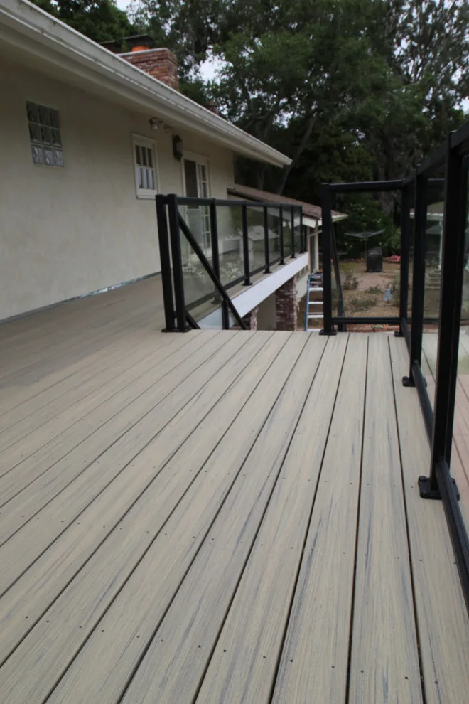 Effortless Composite Deck with Black-Framed Glass Railing by Arroyo Grande Deck And Fence - Photo 7