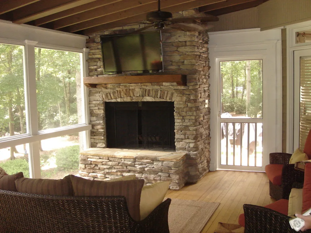 Macon GA patio enclosure featuring an outdoor fireplace by Archadeck Of Central GA - Photo 4