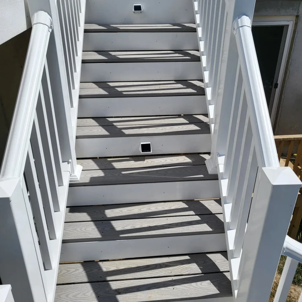 20x12 Composite Deck with Custom Two-Tier Steps and White Fascia Wrap by Jaguar Decks And Fences - Photo 4