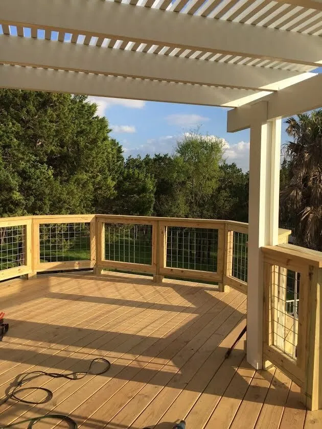 Expansive Outdoor Deck with Spiral Staircase by Moss Contracting Services - Photo 3