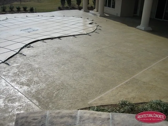 Swimming area patio by Architectural Concrete - Photo 5