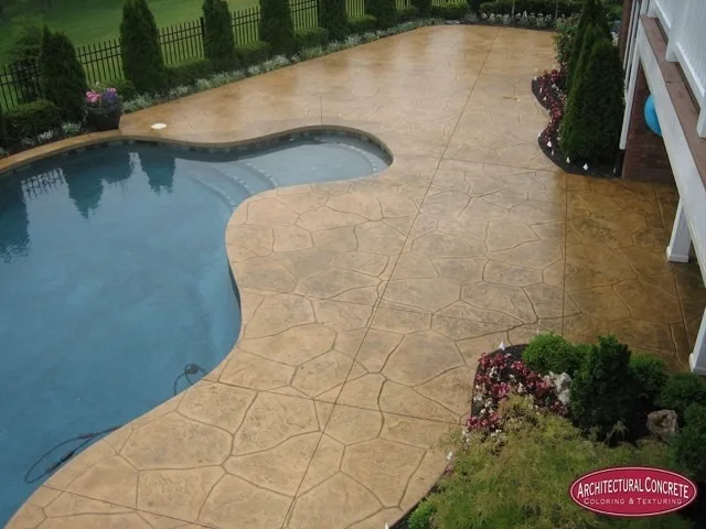Swimming area patio by Architectural Concrete - Photo 4