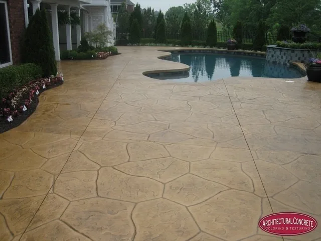 Swimming area patio by Architectural Concrete - Photo 6