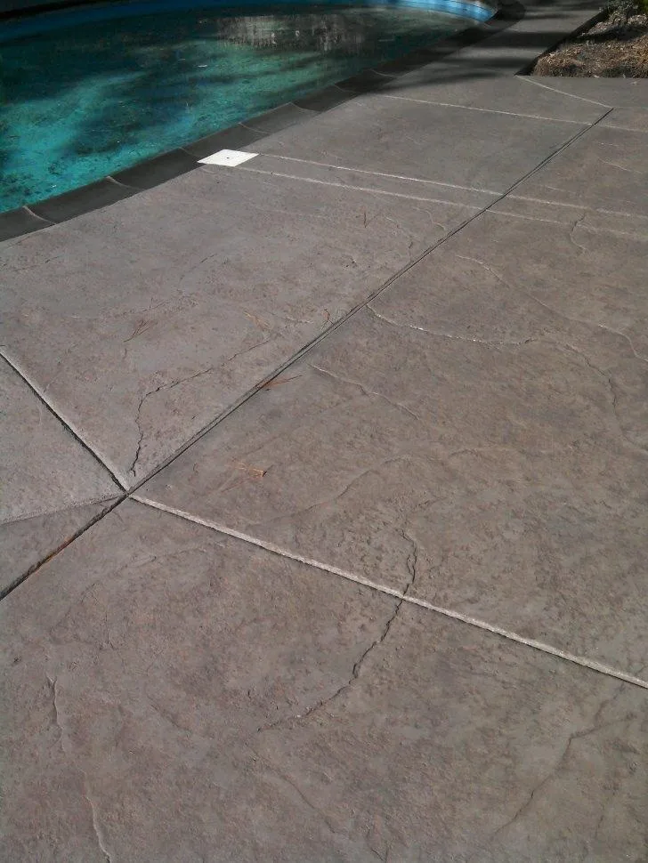 Swimming area patio by Architectural Concrete - Photo 8