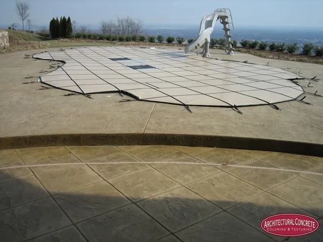 Swimming area patio by Architectural Concrete - Photo 7