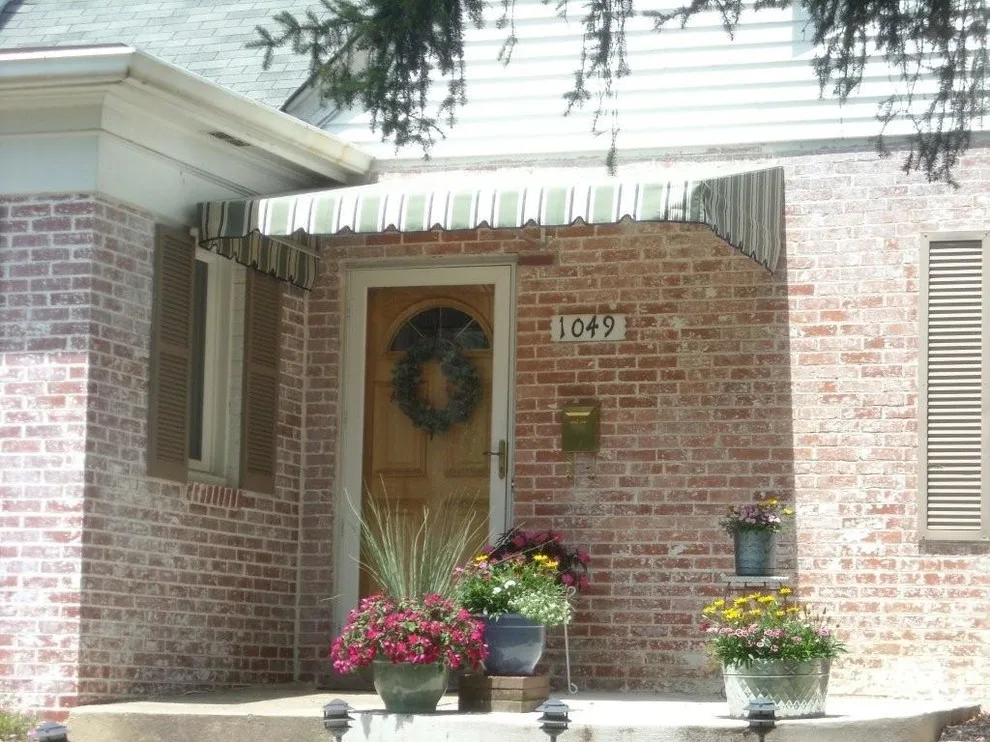 Home window and door canopies by Capital City Awning - Photo 9