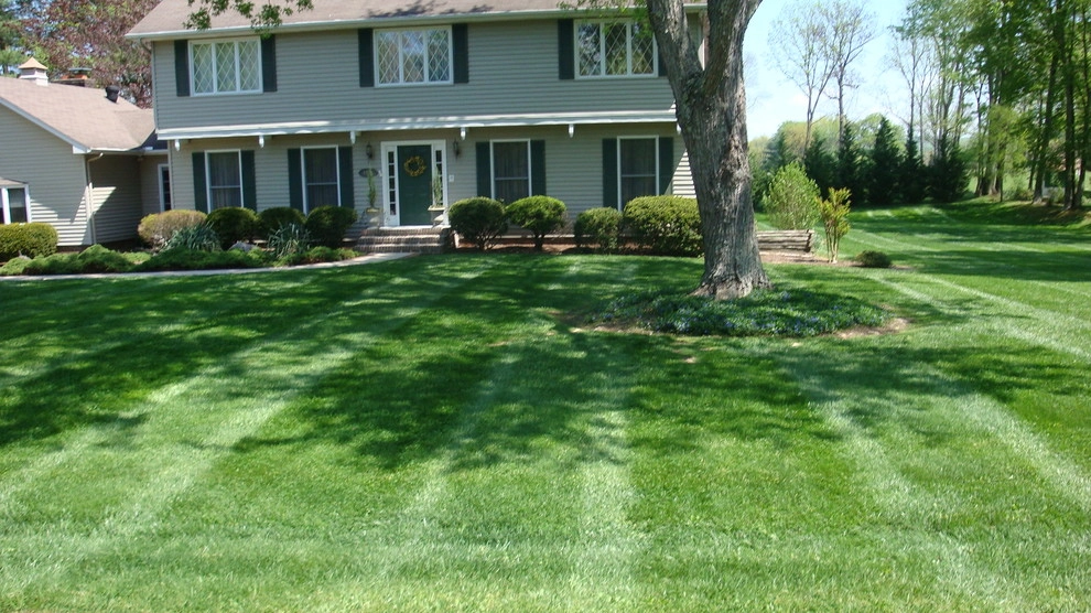 Landscapes by Safari Lawn & Landscape - Photo 24