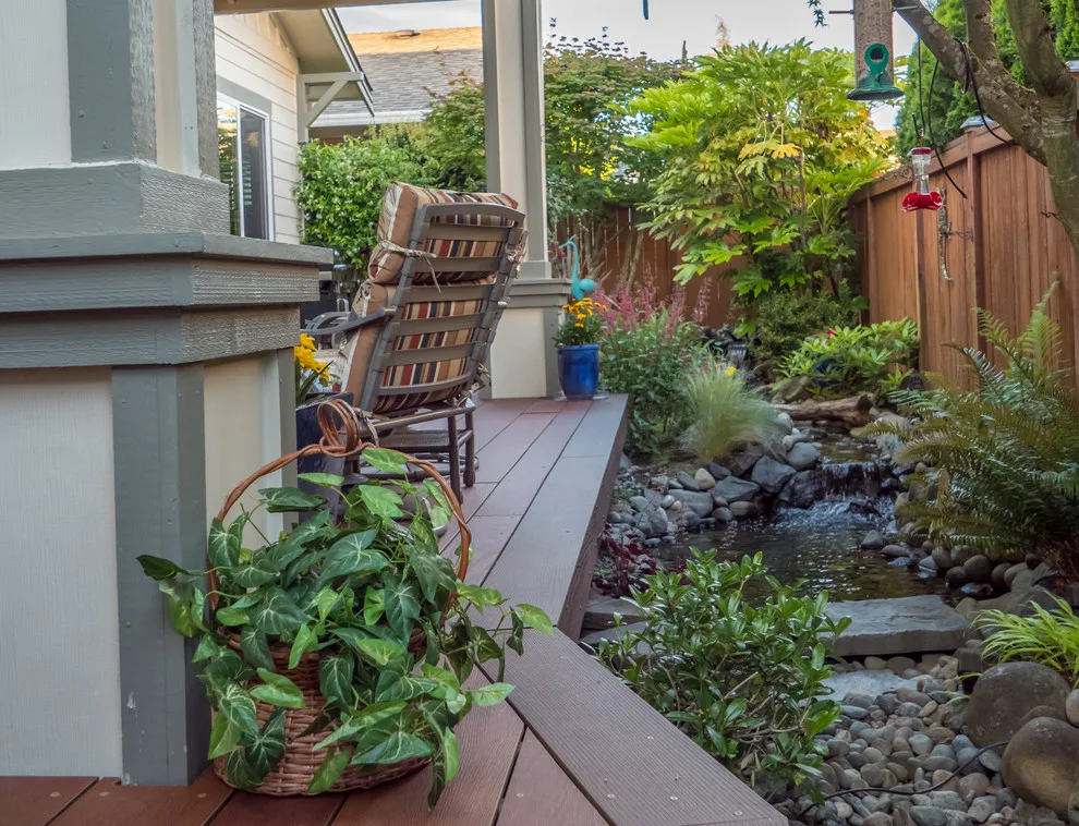 A Compact Backyard by Deck Builders Inc - Photo 4