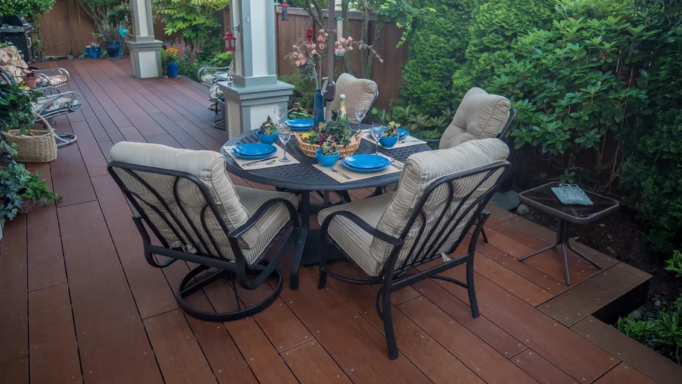 A Compact Backyard by Deck Builders Inc - Photo 5