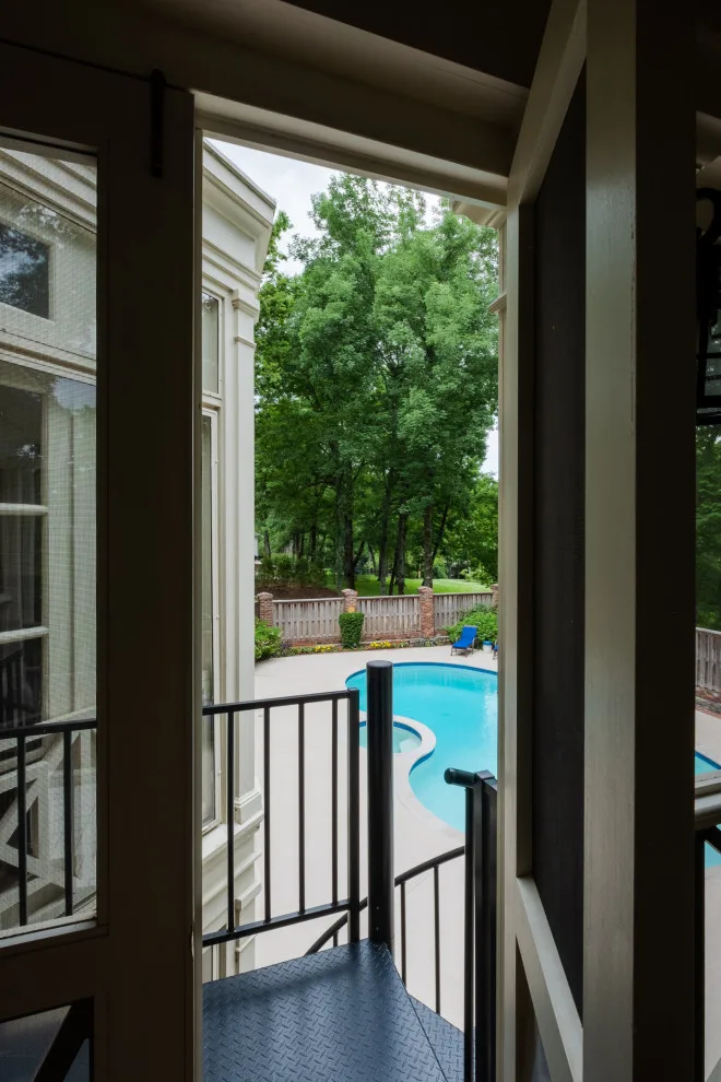 A Two-Level Patio by the Swimming Pool by The Porch Company - Photo 9