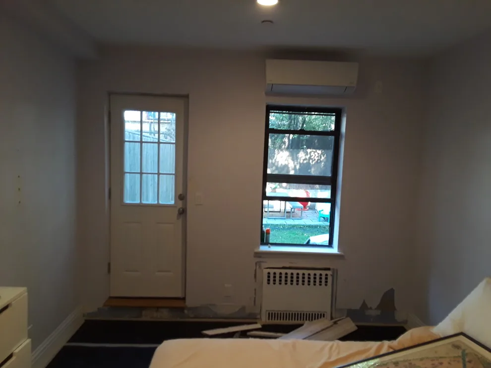 First Floor and Basement Restoration Following Flood Damage by Modern Improvement NY Inc - Photo 23