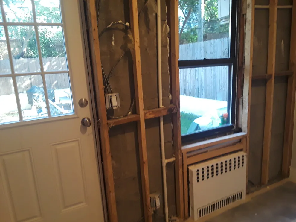 First Floor and Basement Restoration Following Flood Damage by Modern Improvement NY Inc - Photo 11