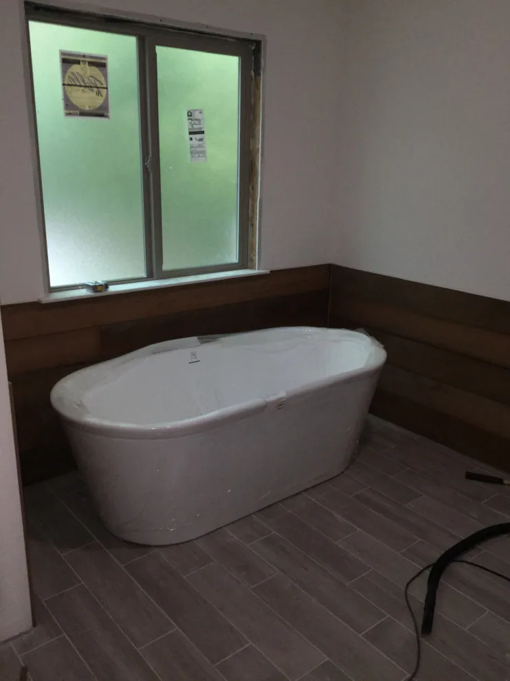 Weathered wood wainscoting bath tile deck by Grand Deck Builders - Photo 3