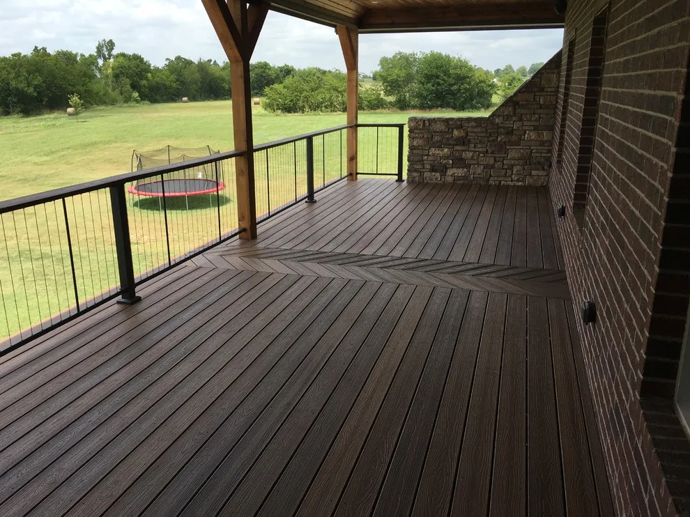 Stunning raised deck featuring Rain Escape for outdoor enjoyment below by Lazo Pro Patios & Decks - Photo 3