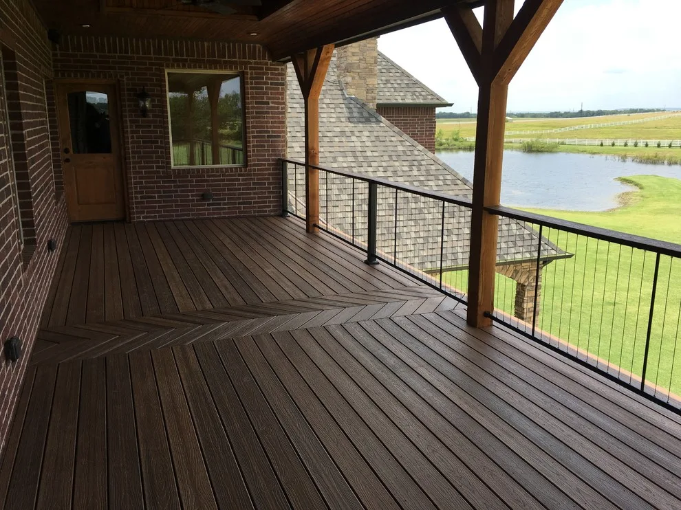 Stunning raised deck featuring Rain Escape for outdoor enjoyment below by Lazo Pro Patios & Decks - Photo 4