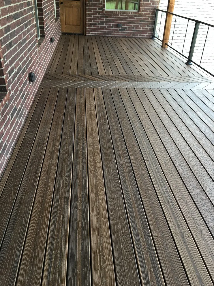 Stunning raised deck featuring Rain Escape for outdoor enjoyment below by Lazo Pro Patios & Decks - Photo 10