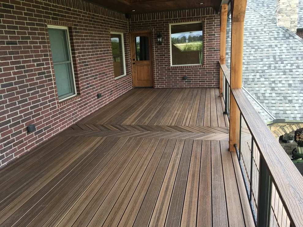 Stunning raised deck featuring Rain Escape for outdoor enjoyment below by Lazo Pro Patios & Decks - Photo 12
