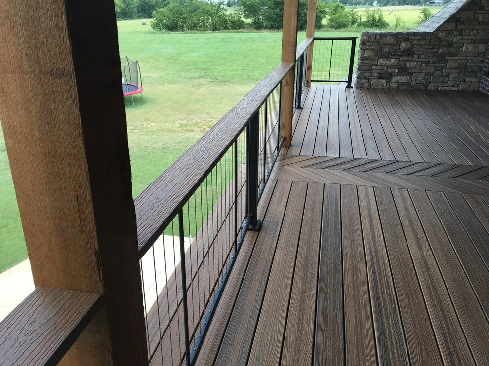 Stunning raised deck featuring Rain Escape for outdoor enjoyment below by Lazo Pro Patios & Decks - Photo 5