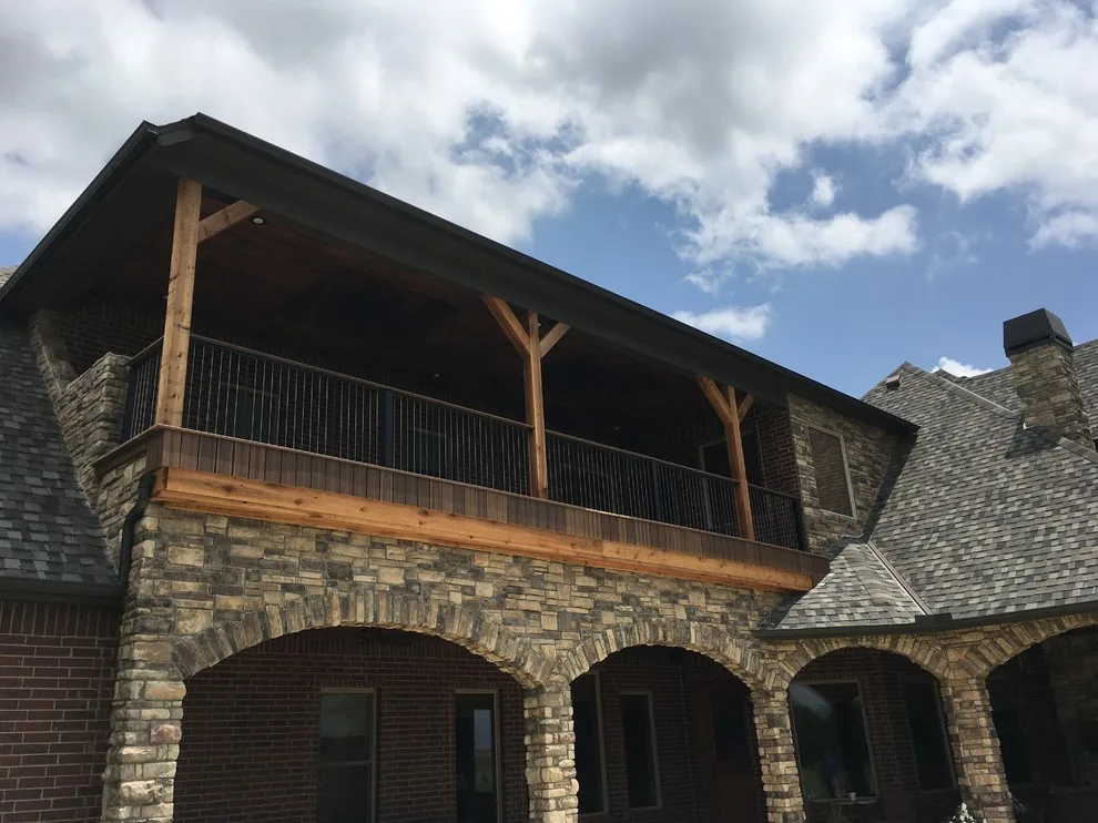 Stunning raised deck featuring Rain Escape for outdoor enjoyment below by Lazo Pro Patios & Decks - Photo 14