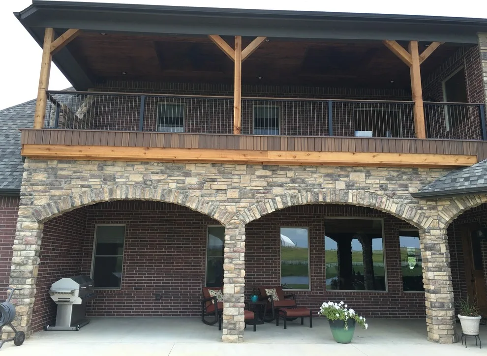 Stunning raised deck featuring Rain Escape for outdoor enjoyment below by Lazo Pro Patios & Decks - Photo 13