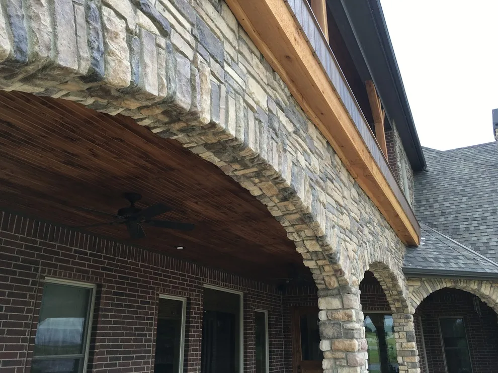 Stunning raised deck featuring Rain Escape for outdoor enjoyment below by Lazo Pro Patios & Decks - Photo 7