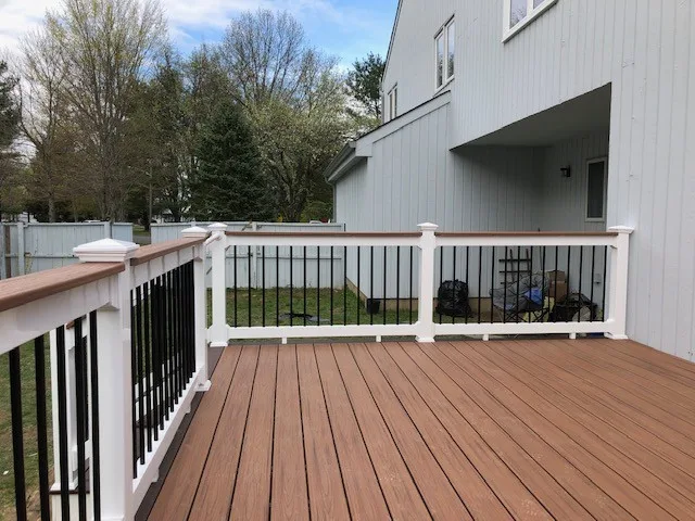 Stunning TREX Transcend "Tiki Torch" deck featuring cocktail railing by DTR Construction Service - Photo 2
