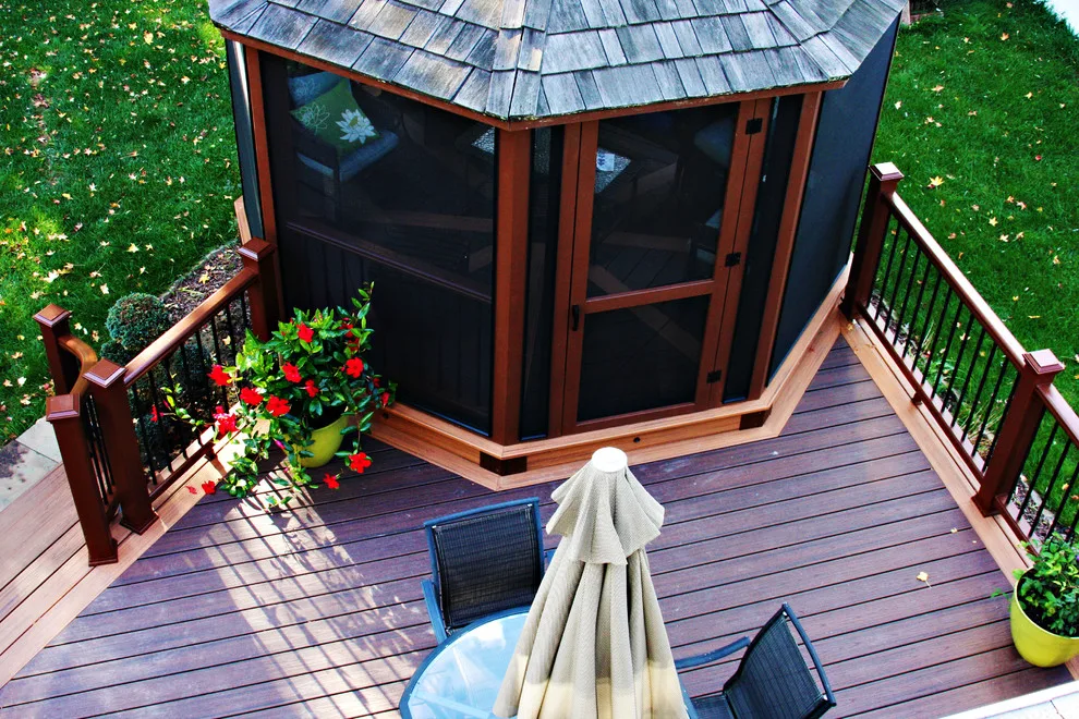 Screened Gazebo with Circular Fire Pit Deck by Miles Deck Construction - Photo 7