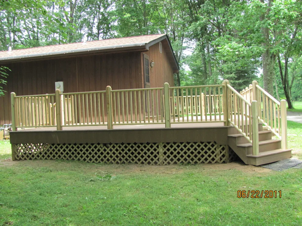 Wood-railed composite deck by Sweetwater Woodcraft - Photo 7