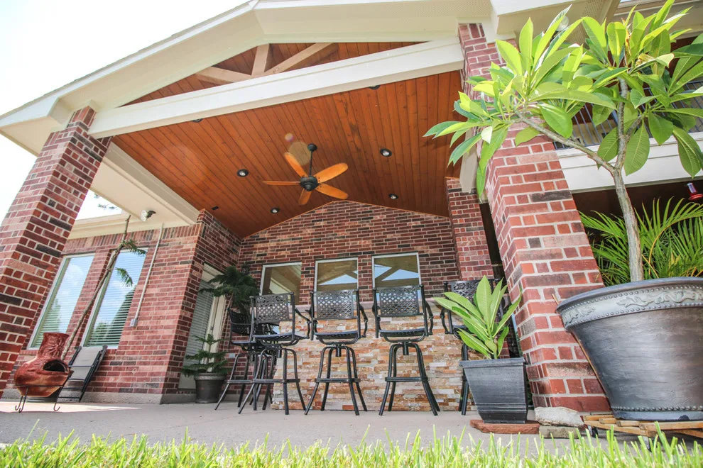 Cypress, TX Outdoor Kitchen with Covered Patio by Tradition Outdoor Living - Photo 13