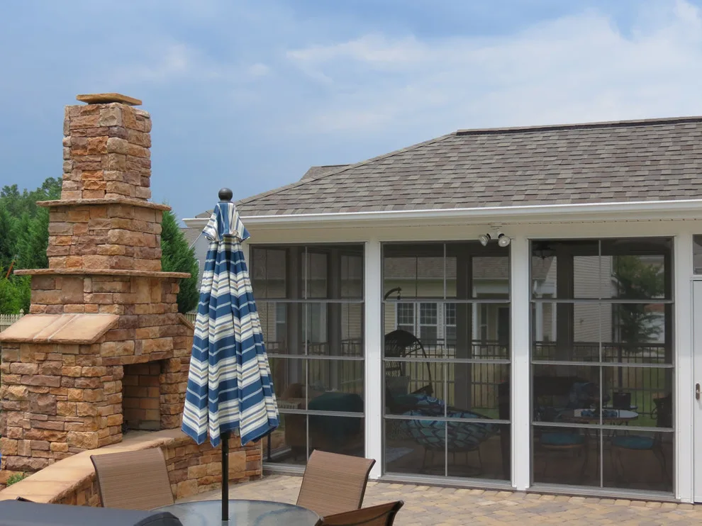 Patio and Deck with Fireplace by Deckscapes Inc - Photo 4