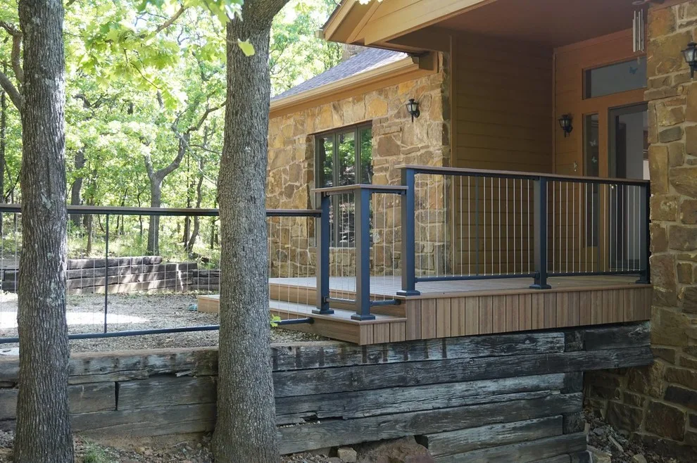 Deck featuring stainless steel cable railing by Lazo Pro Patios & Decks - Photo 6