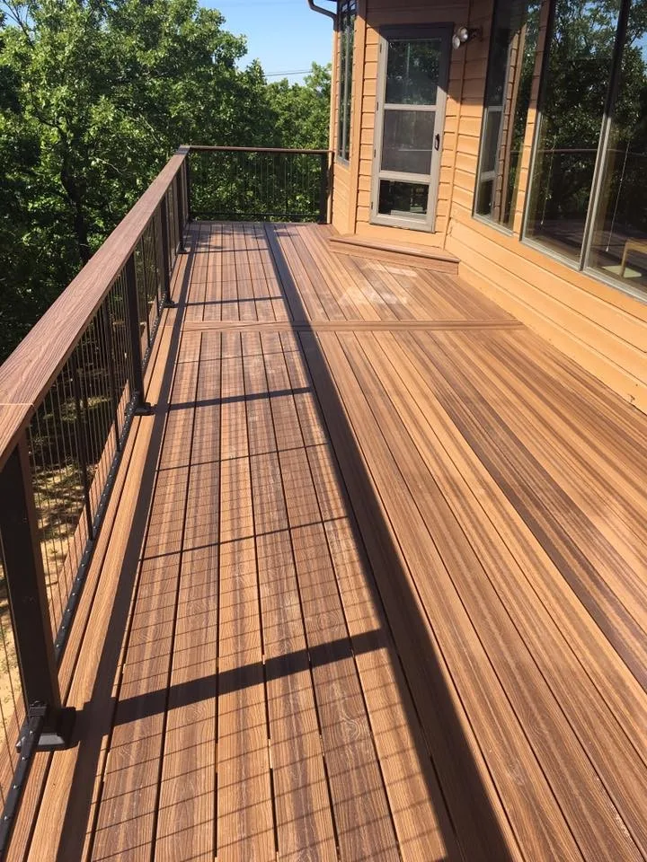Deck featuring stainless steel cable railing by Lazo Pro Patios & Decks - Photo 3