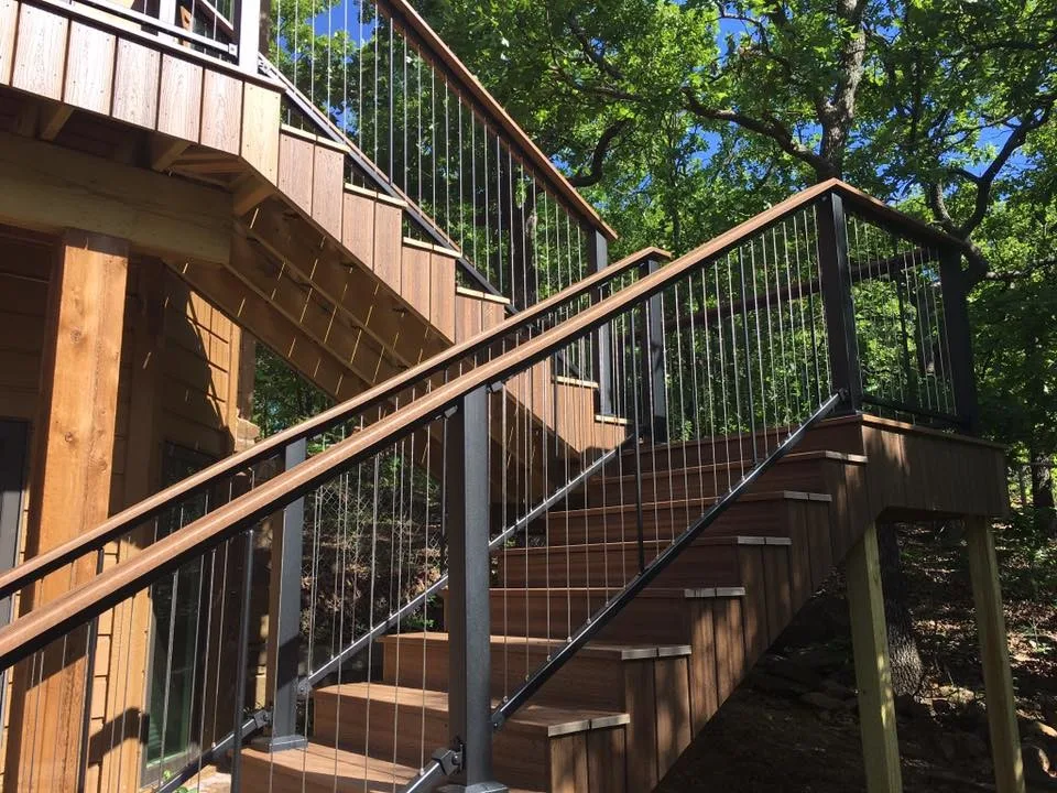 Deck featuring stainless steel cable railing by Lazo Pro Patios & Decks - Photo 5