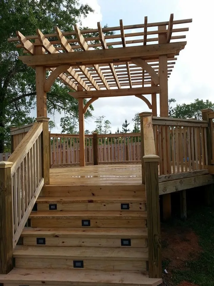 tiered deck with arbor and lighting by Custom Southern Structures - Photo 2