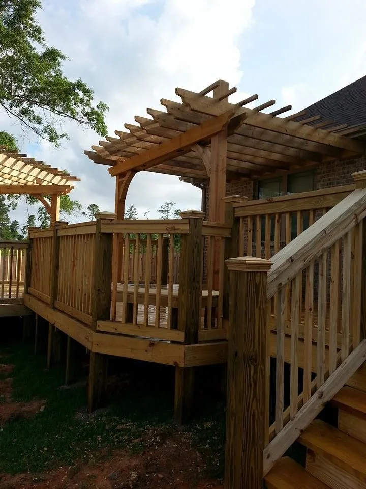 tiered deck with arbor and lighting by Custom Southern Structures - Photo 4
