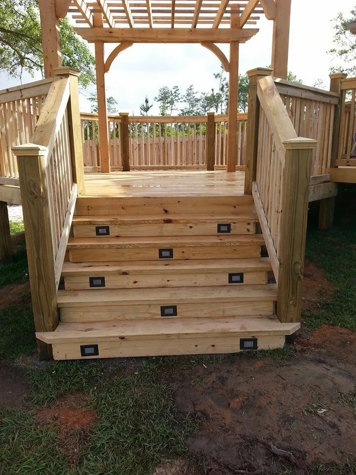 tiered deck with arbor and lighting by Custom Southern Structures - Photo 3