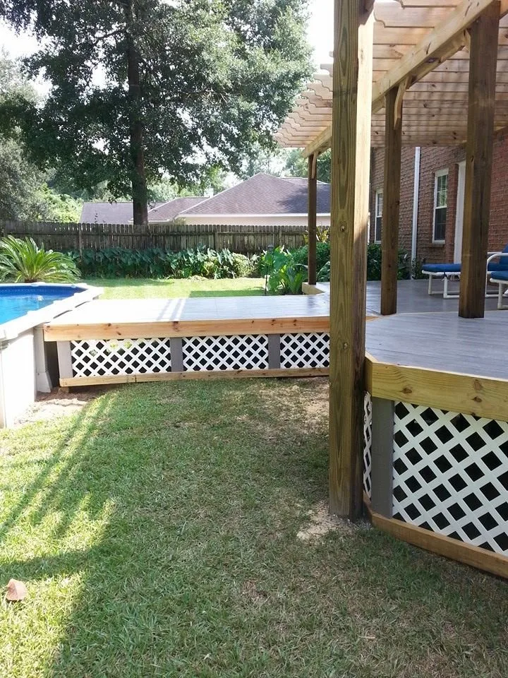 Deck with skirting and pergola by Custom Southern Structures - Photo 2