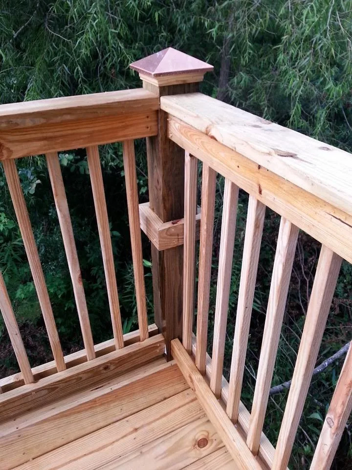 deck featuring 6x6 railings and decorative finial caps by Custom Southern Structures - Photo 2