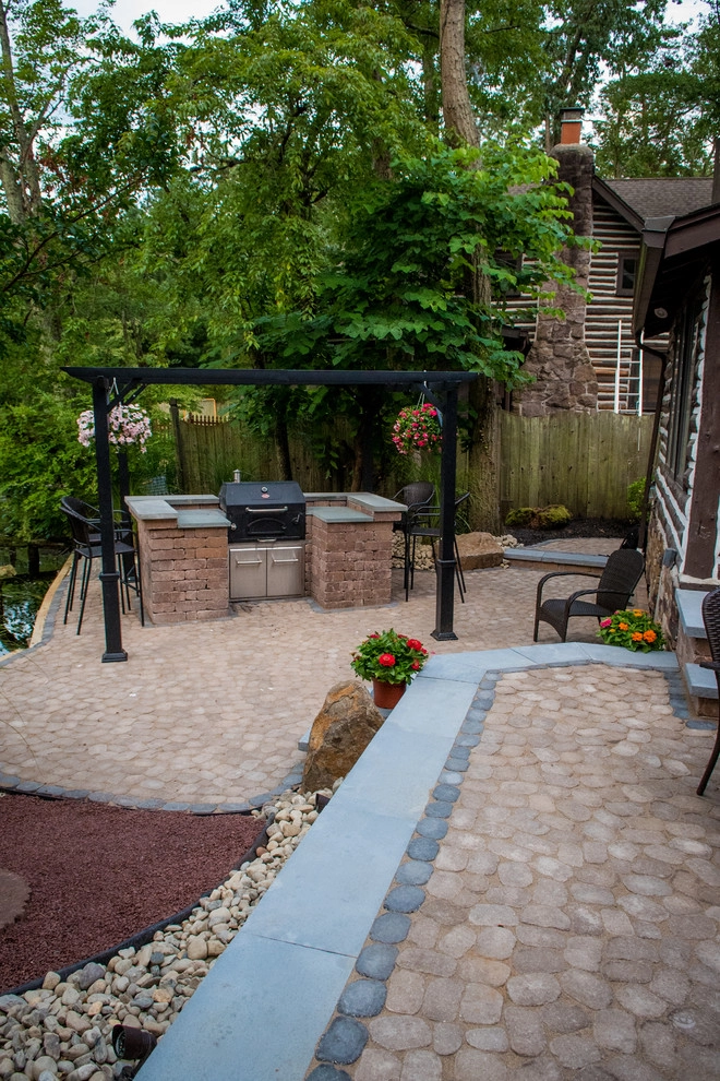 Lake Front Patio and Built In Grill by Sherwood Landscape Lighting And Design - Photo 8